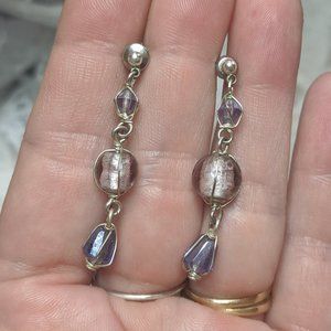 Purple glass caged dangly pierced earrings